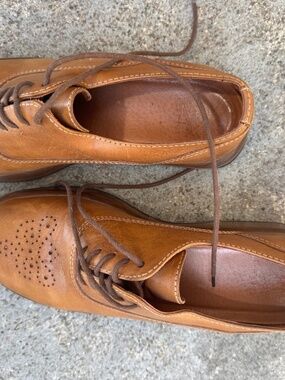 Dansko lace up clogs